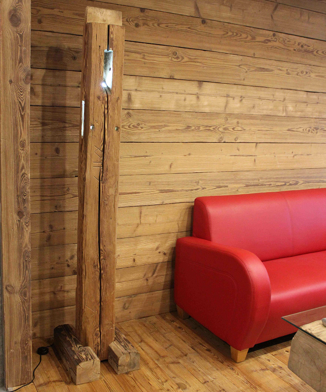 The lamp from hand-hewn beams